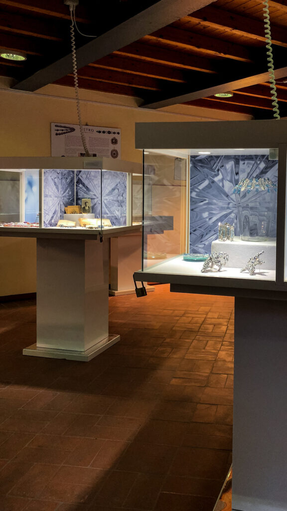 Mushroom vitrines with macro glass backgrounds in the Vetro exhibition, Museo del Bijou di Casalmaggiore