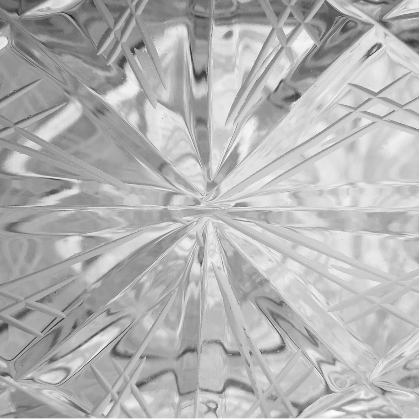 Macro photograph of cut crystal used as a vitrine background, Sogand Nobahar