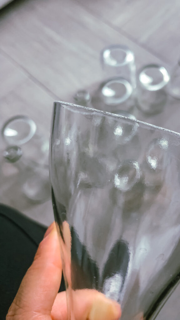 Hand-ground edge of a cut glass bottle section, finished by hand for the Museo del Bijou display