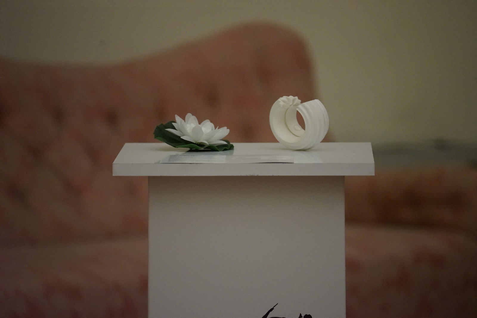 White sintered nylon sculpture on a plinth in an exhibition at the Reggia di Caserta, Nobahar Design