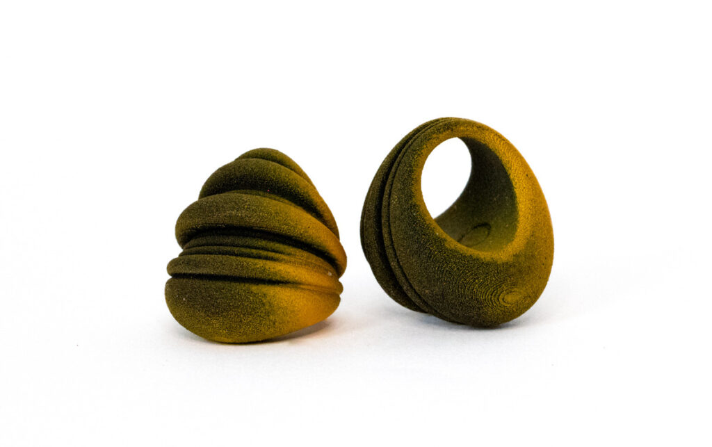 Two views of the same ring on a plain white background in the style of a product listing, with no shadow, ground or context